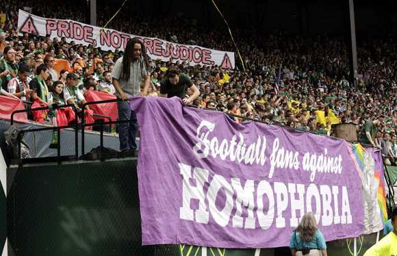 Fans at a Portland Timbers match show their solidarity by supporting IDAHOBIT / AP